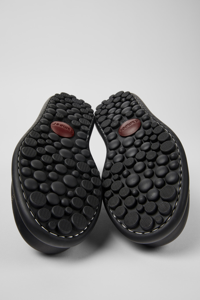 The soles of Twins Black Leather Shoe for Women