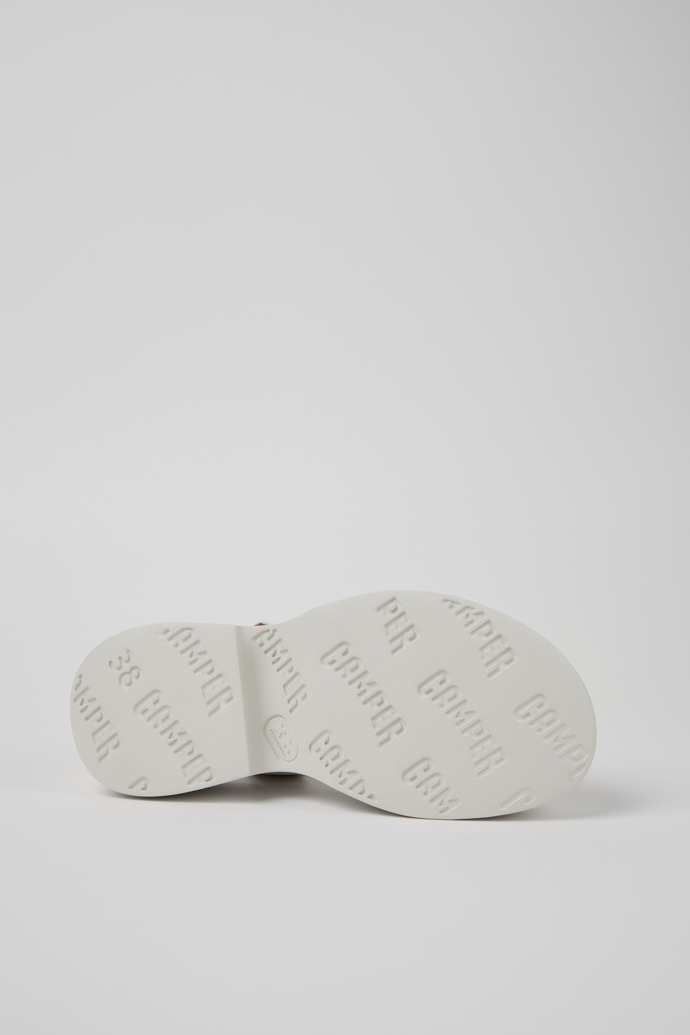 The soles of Tasha White Leather Sandals for Women.