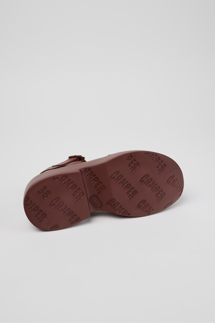 The soles of Tasha Burgundy Leather Sandals for Women.