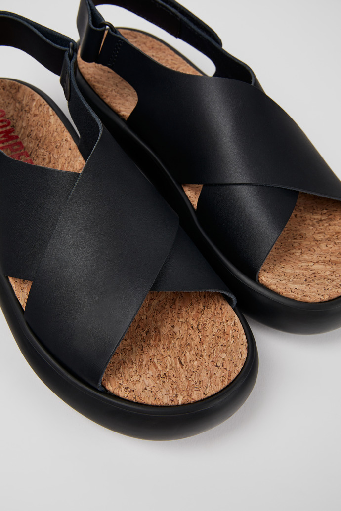 Close-up view of Pelotas Flota Black Leather Cross-strap Sandal for Women