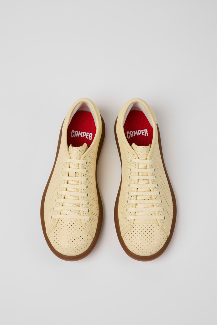 Overhead view of Pelotas Soller Yellow Leather Sneakers for Women.