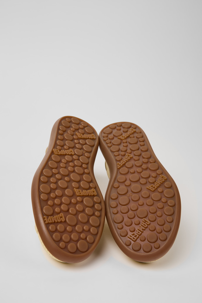 The soles of Pelotas Soller Yellow Leather Sneakers for Women.