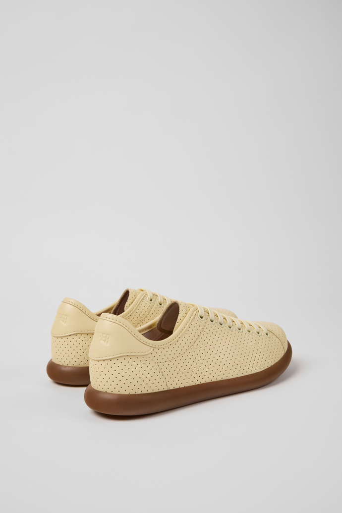 Back view of Pelotas Soller Yellow Leather Sneakers for Women.