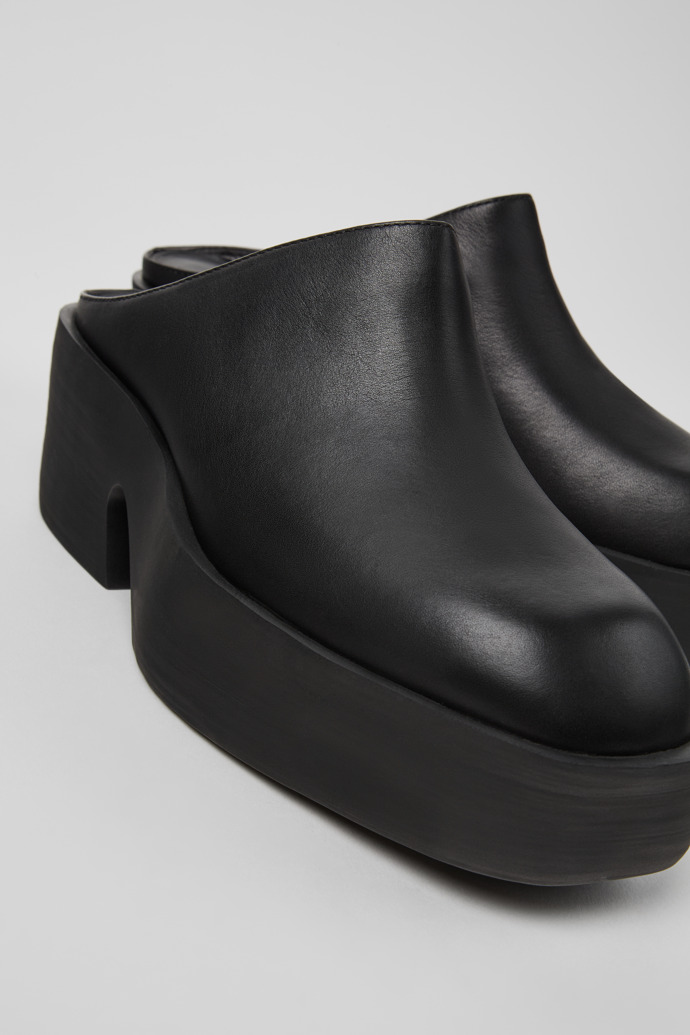 Close-up view of Billie Black leather clogs for women