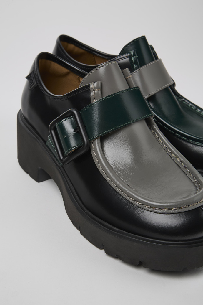 Close-up view of Twins Black and gray leather loafers for women