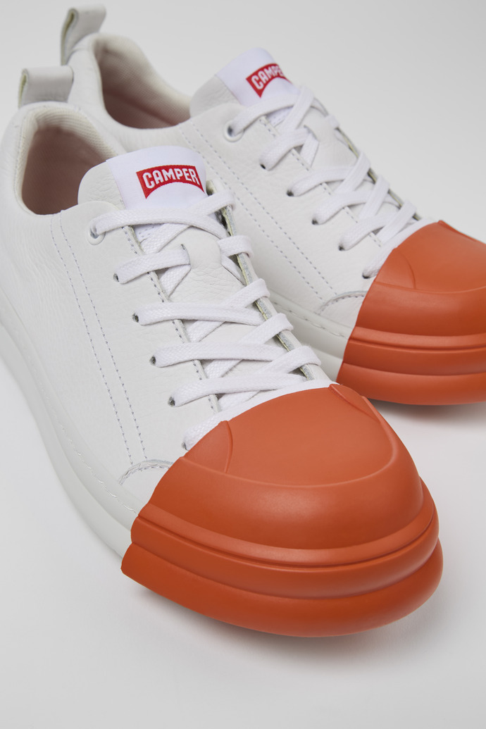 Close-up view of Junction Runner White leather sneakers for women