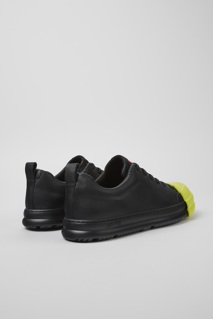 Junction Runner Sneaker de dona de pell de color negre