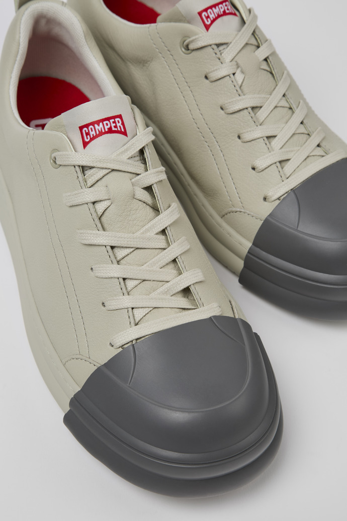 Close-up view of Junction Runner Gray leather sneakers for women