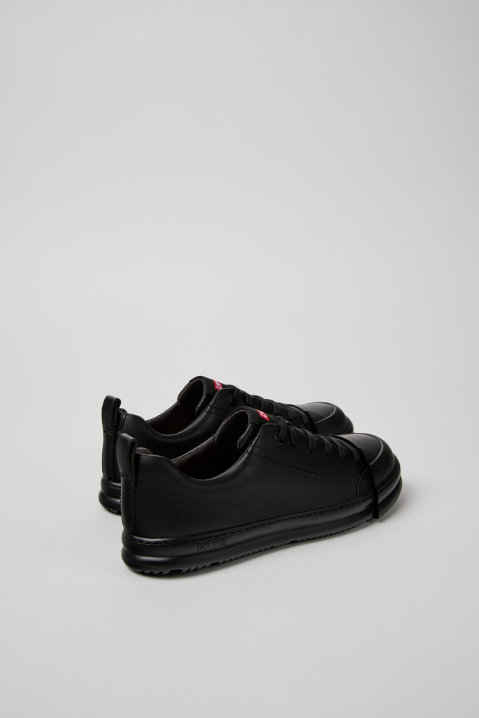 Back view of Junction Runner Black Leather Sneakers for Women.