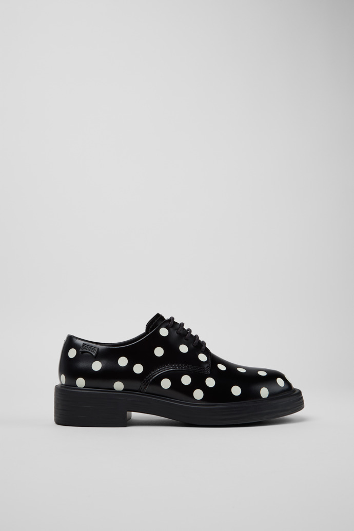 Side view of Dean Black and White Leather Shoes for Women.