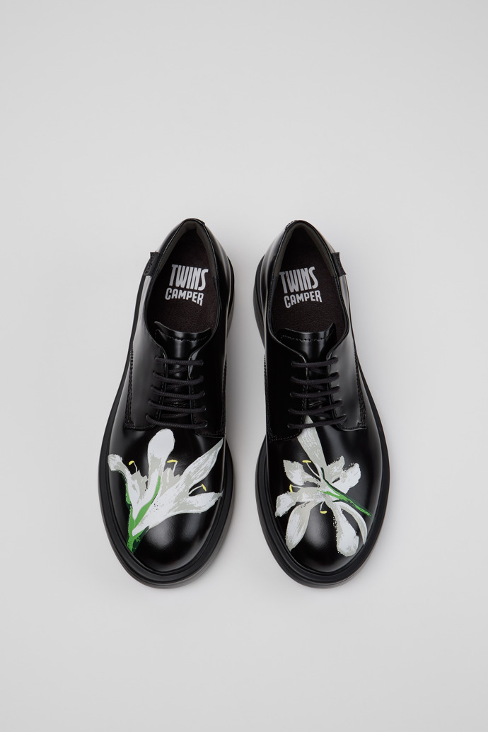 Twins Schwarze und weiße Lederschuhe für Damen.