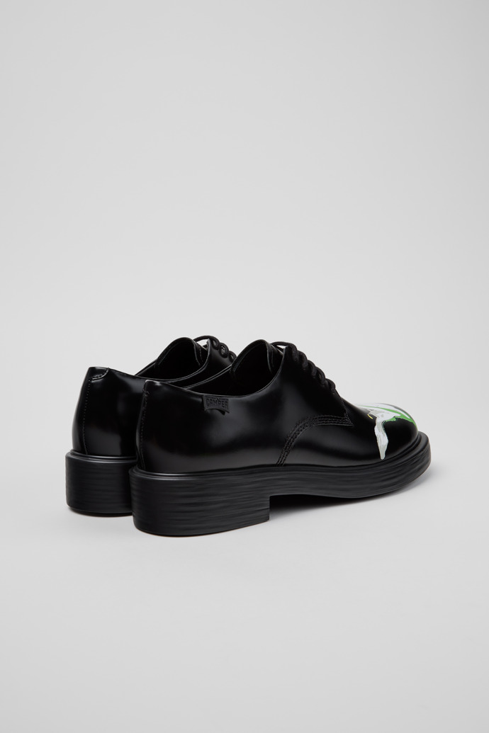 Twins Schwarze und weiße Lederschuhe für Damen.