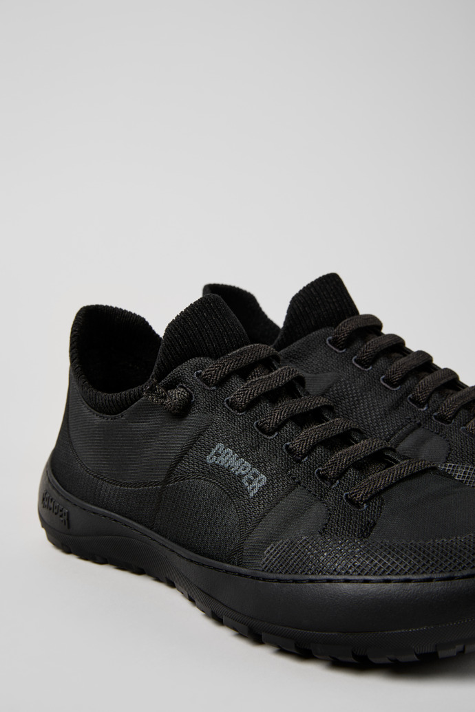 Close-up view of Peu Serra 360º Durable Black Engineered Material Sneakers for Women