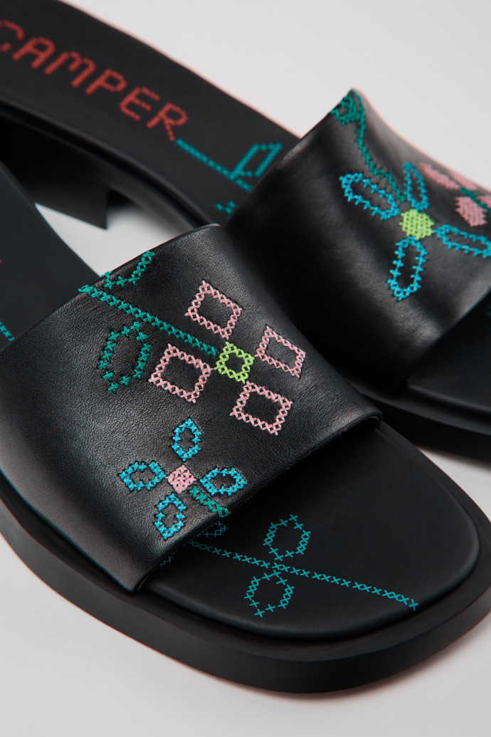 Close-up view of Twins Black Leather Women's Sandal.