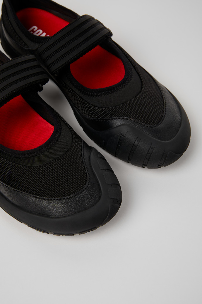 Close-up view of Path Black Leather Sneakers for Women.