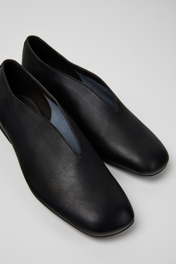 Close-up view of Casi Myra Black Leather Women's Shoes.