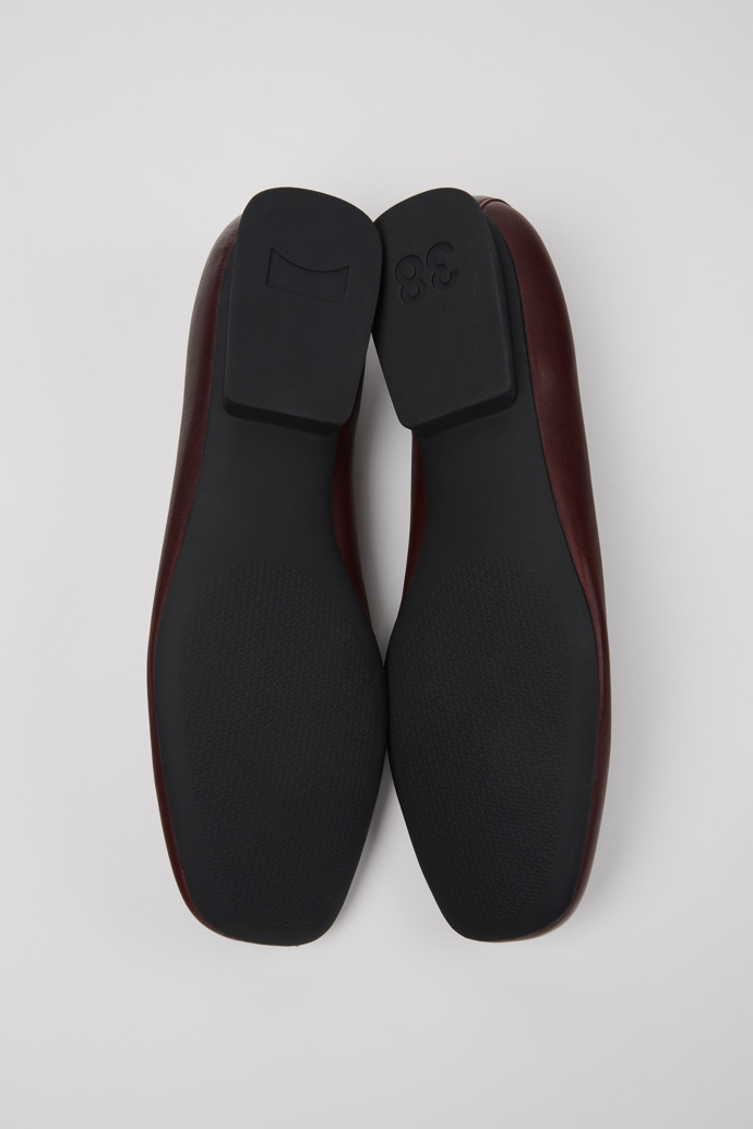 The soles of Casi Myra Burgundy Leather Shoes for Women.