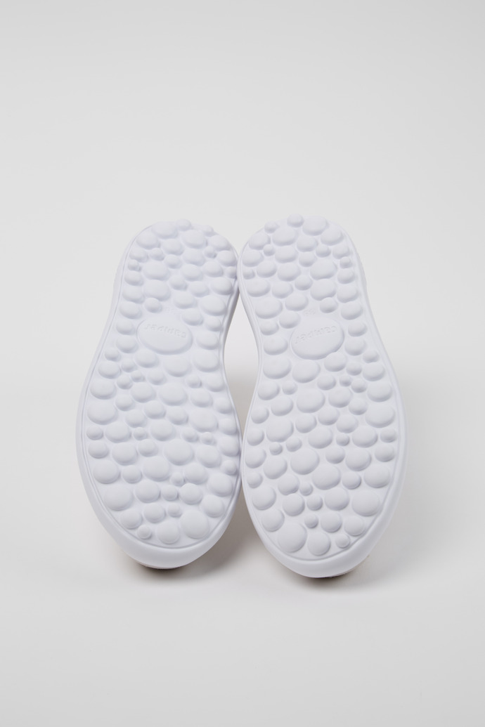 The soles of Pelotas XLite White Recycled PET and Nubuck Sneakers for Women.