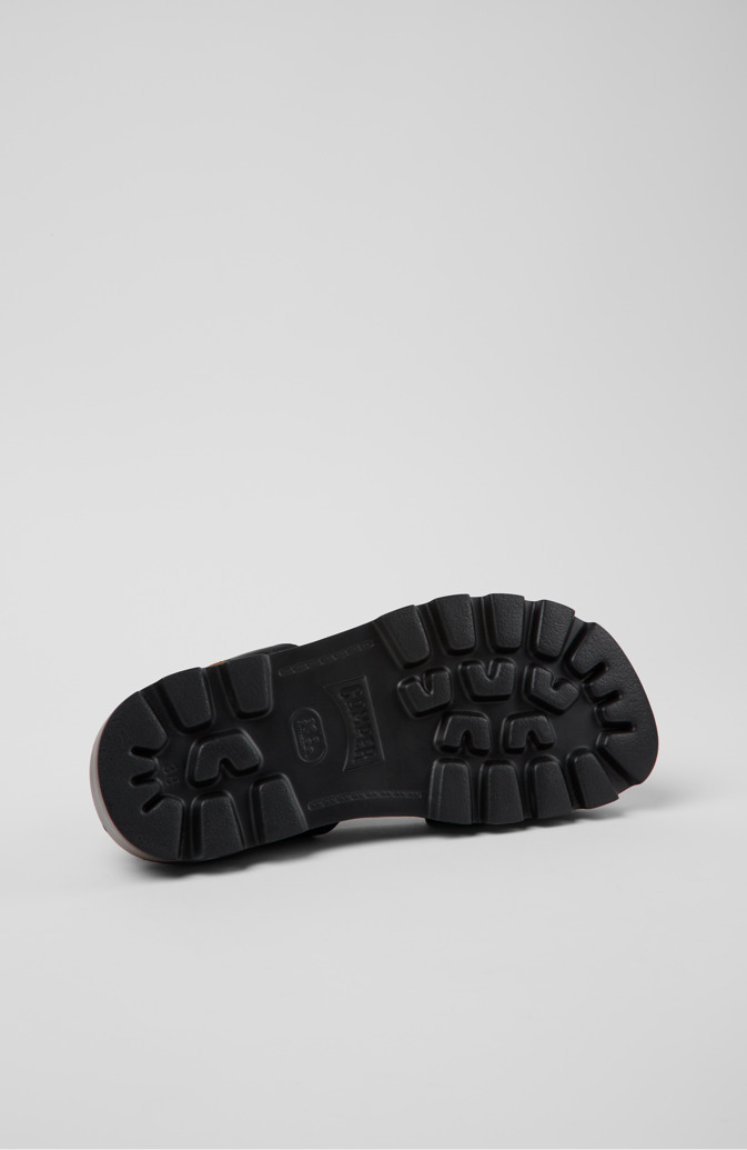 The soles of Brutus Sandal Black Leather Sandals for Women.