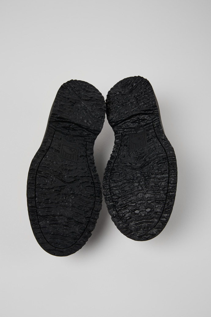 The soles of Walden Black Leather Women's Moccasin/Ballerina.