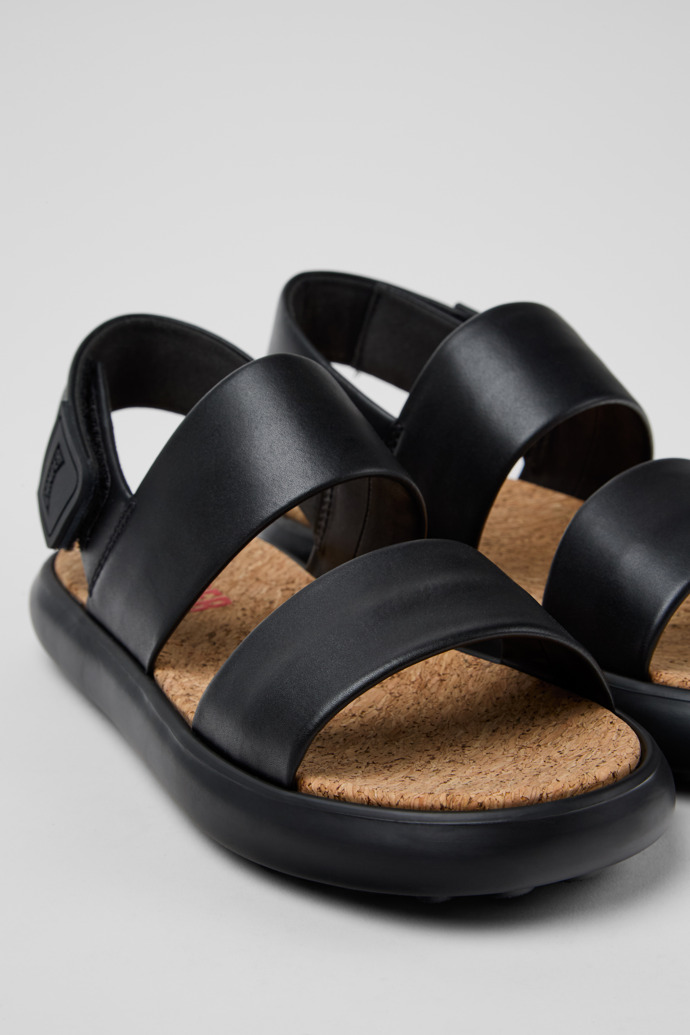 Close-up view of Pelotas Flota Black Leather Sandals for Women.