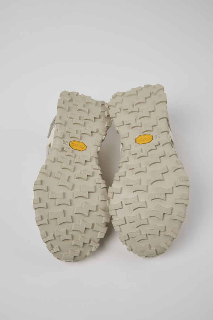 The soles of Drift Trail Beige Textile and Nubuck Sneakers for Women.