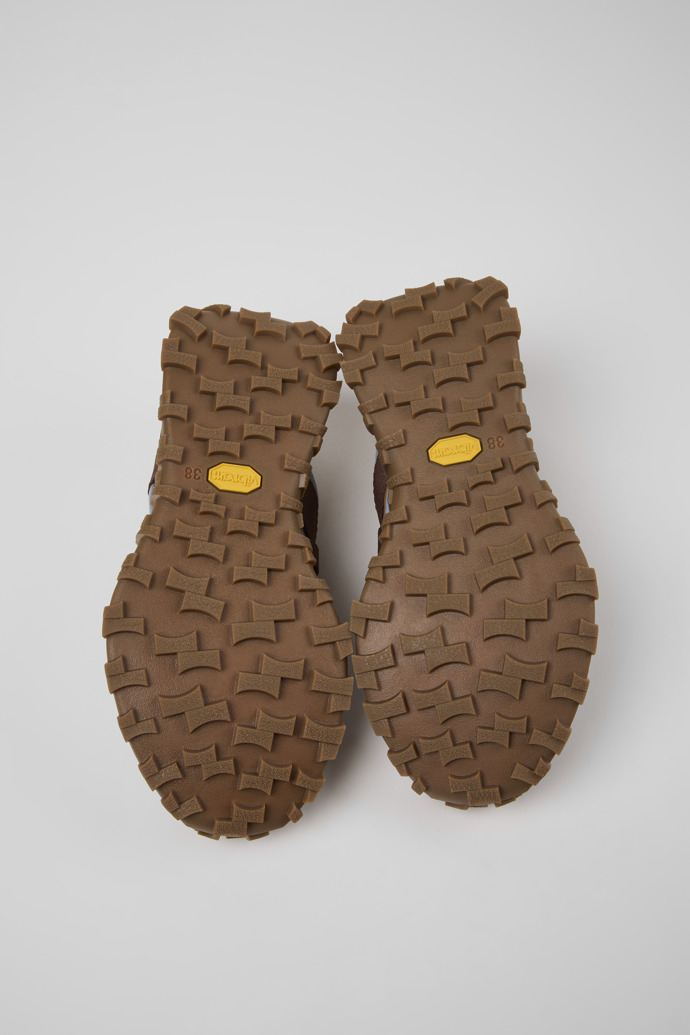 The soles of Drift Trail Brown Textile and Nubuck Leather Sneakers for Women.