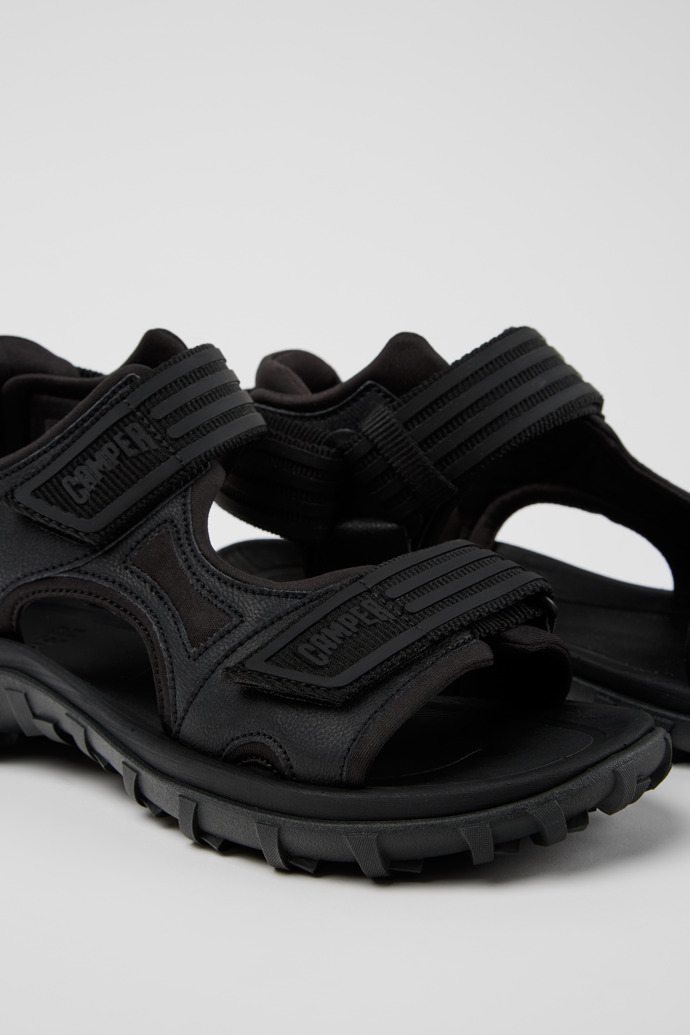 Close-up view of Drift Trail Sandal Black Leather Women's Sandals.