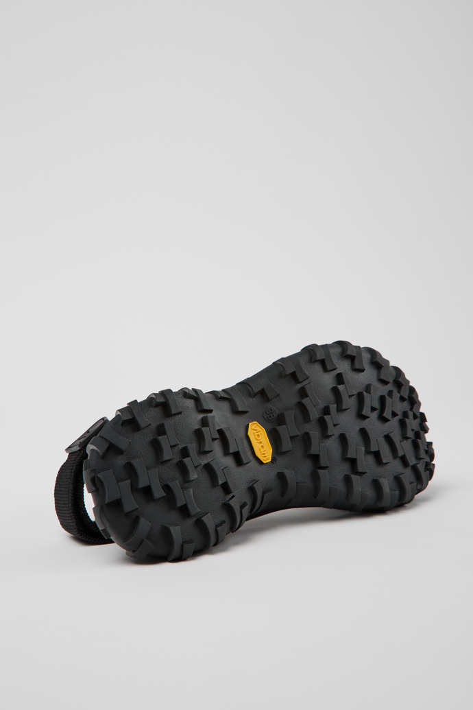 The soles of Drift Trail Sandal Black Recycled PET Sandals for Women.