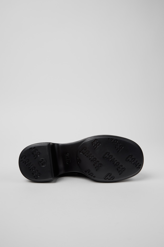 The soles of Thelma II Black Leather Moccasins for Women.