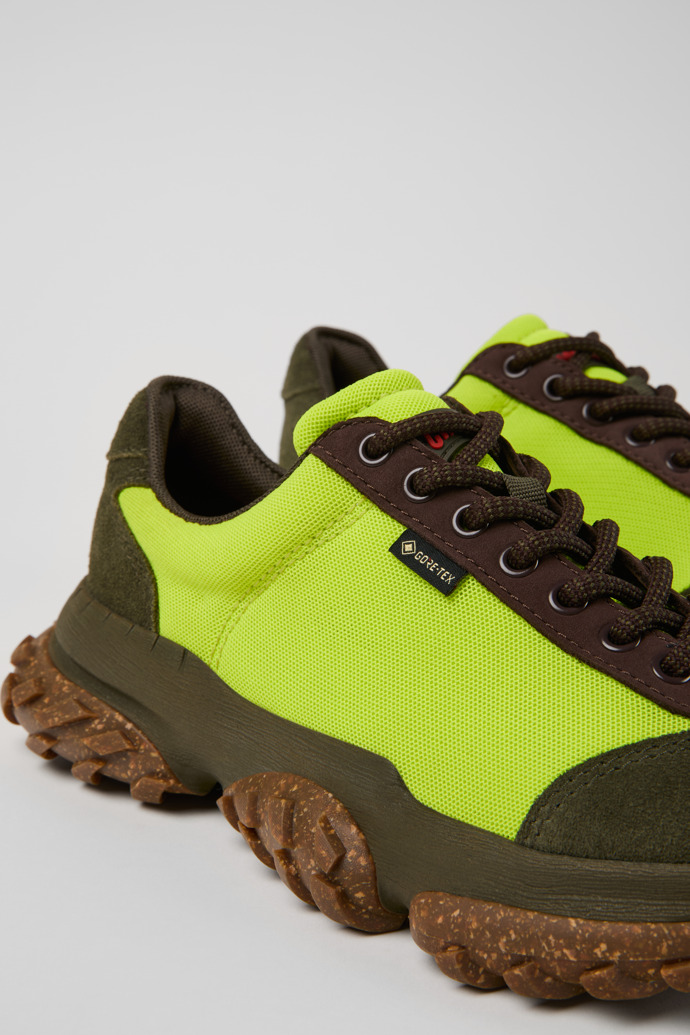 Close-up view of Karst Trek - GORE-TEX Green and Brown Textile and Nubuck Sneakers for Women.