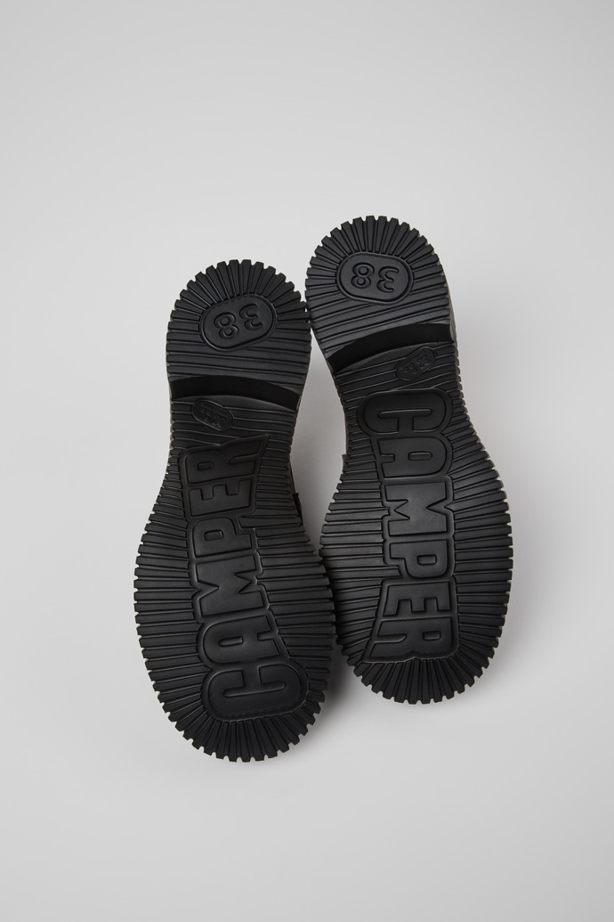 The soles of Pix London Gray Leather Moccasins for Men.
