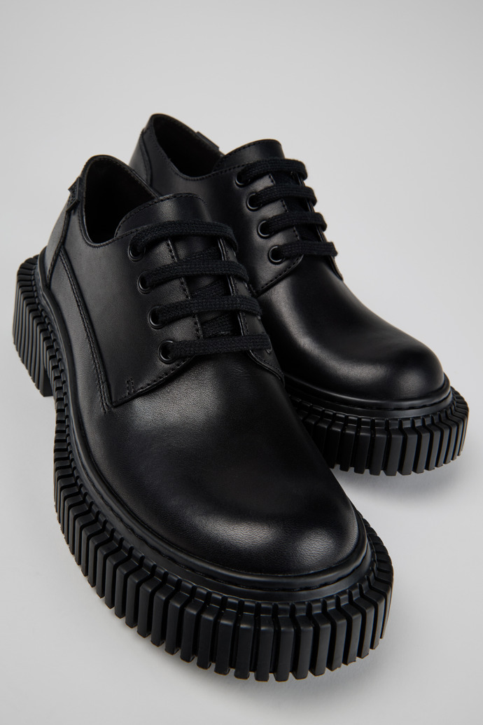 Close-up view of Pix Berlin Black Leather Shoes for Women.
