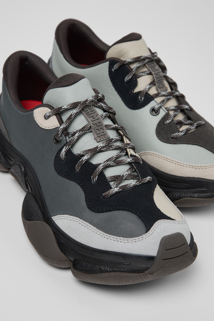 Close-up view of Twins Gray and Black Leather and Nubuck Sneakers for Women.