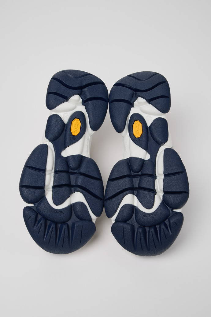 The soles of Twins Blue and Gray Leather Sneakers for Women.