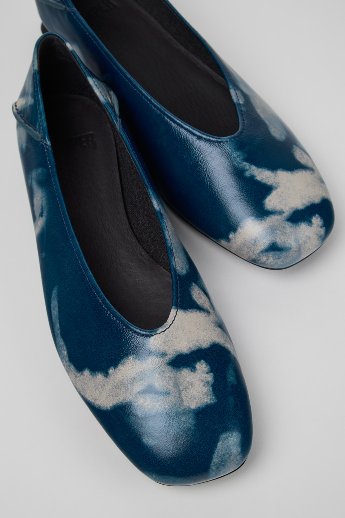 Close-up view of Casi Myra Blue and Gray Leather Ballerinas for Women.