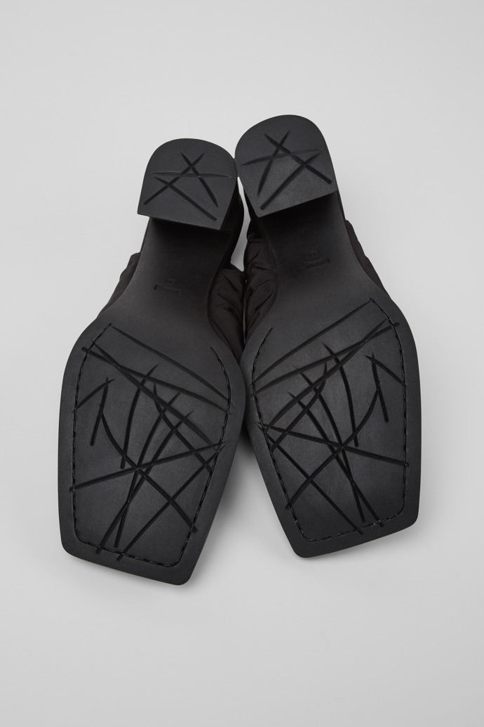 The soles of Karole Black Textile Semi-Open Shoes for Women.