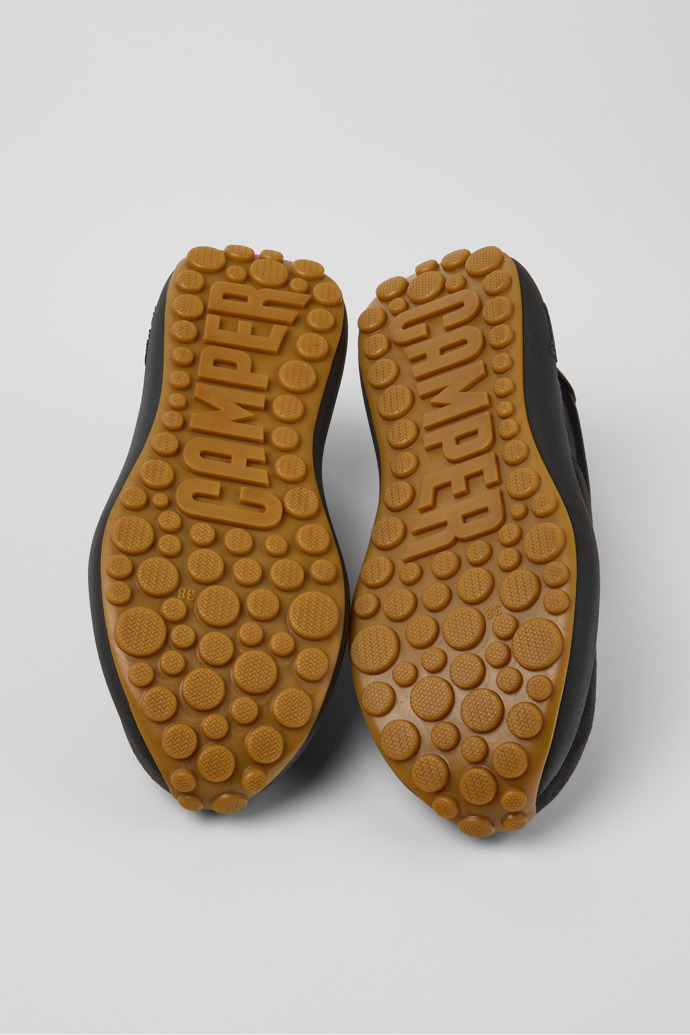 The soles of Pelotas Athens Black and Gray Leather and Nubuck Sneakers for Women.