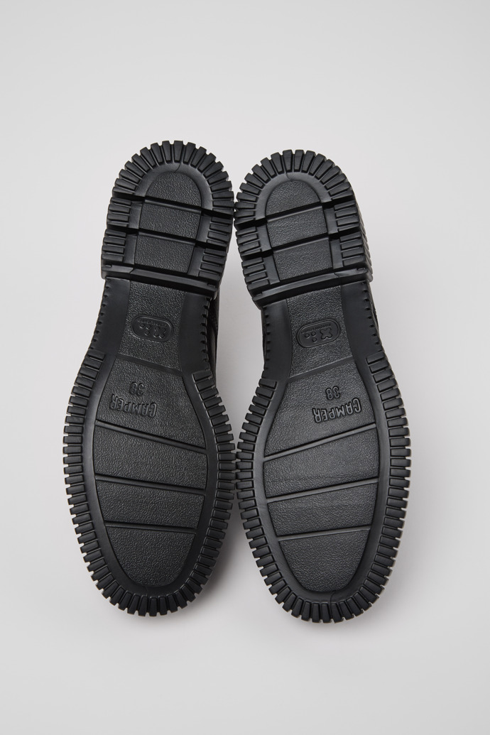 The soles of Pix Black Leather Shoes for Women.