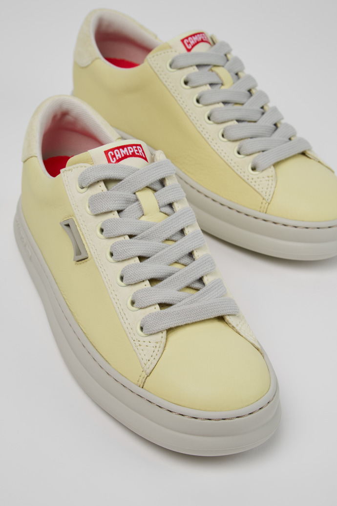 Close-up view of Runner Yellow Leather and Nubuck Sneakers for Women.