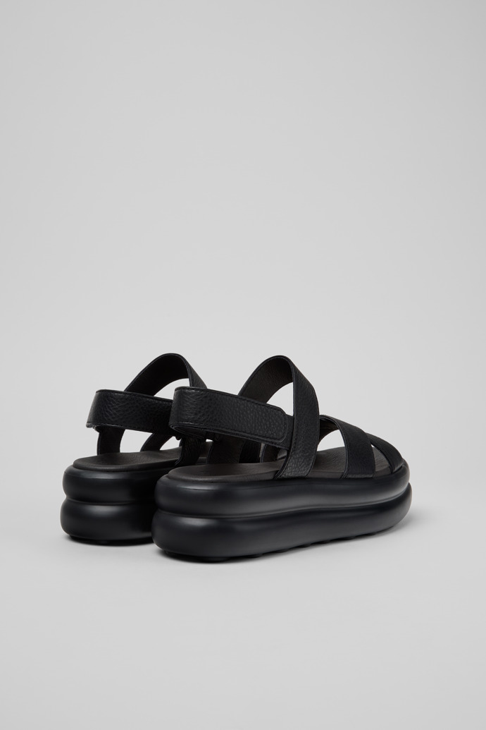 Pelotas Flota Up Sandalias de piel negras para mujer.