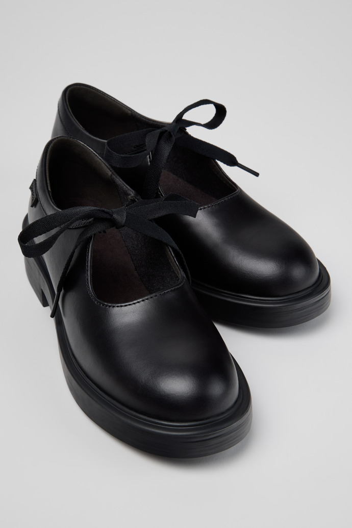 Close-up view of Dean Black Leather Semi-Open Shoes for Women.