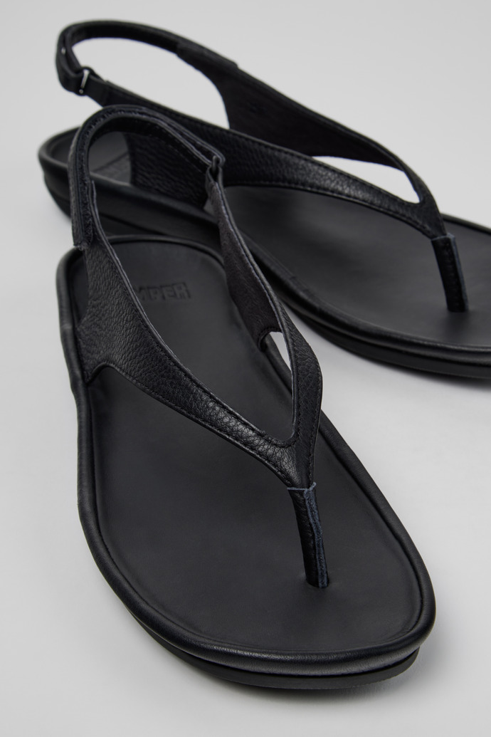 Close-up view of Right Isla Black Leather Sandals for Women.