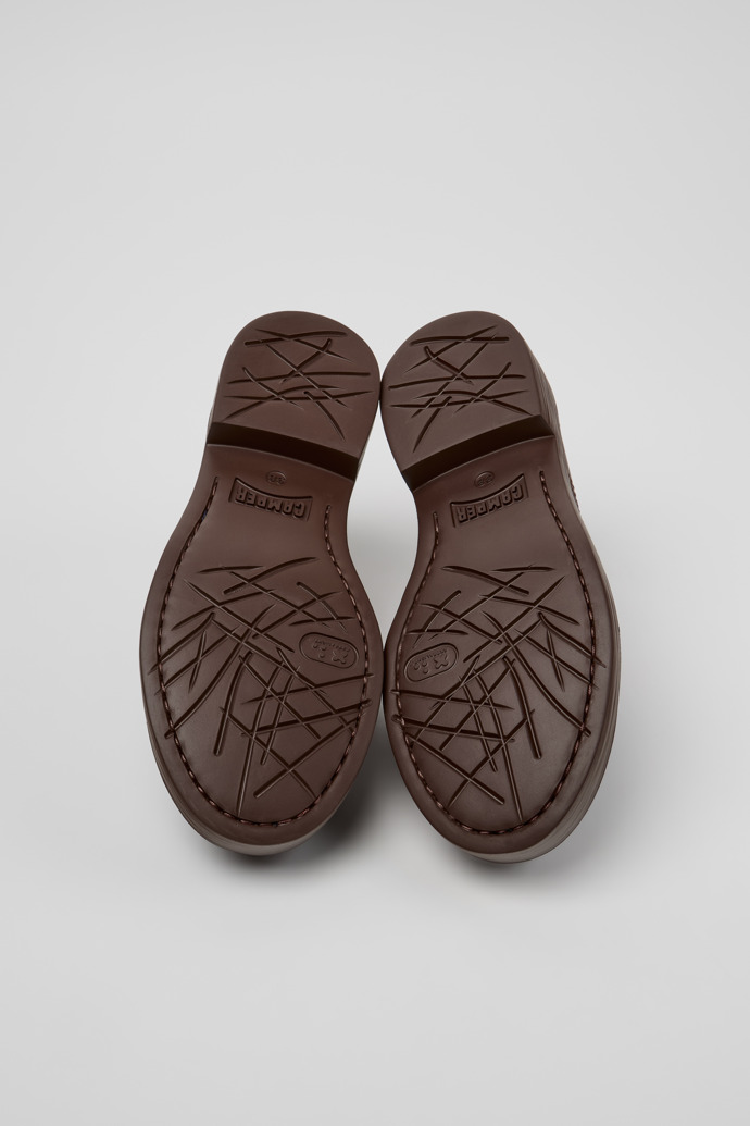 The soles of Twins Brown Leather Moccasins for Women.