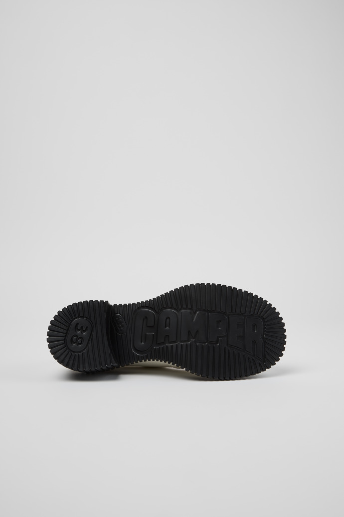 The soles of Pix London White Leather Moccasins for Women.