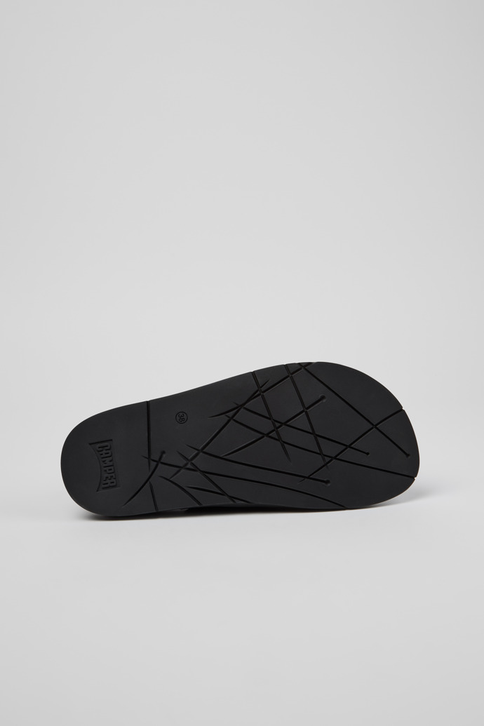 The soles of Lluc Sandal Black Leather Sandals for Women.