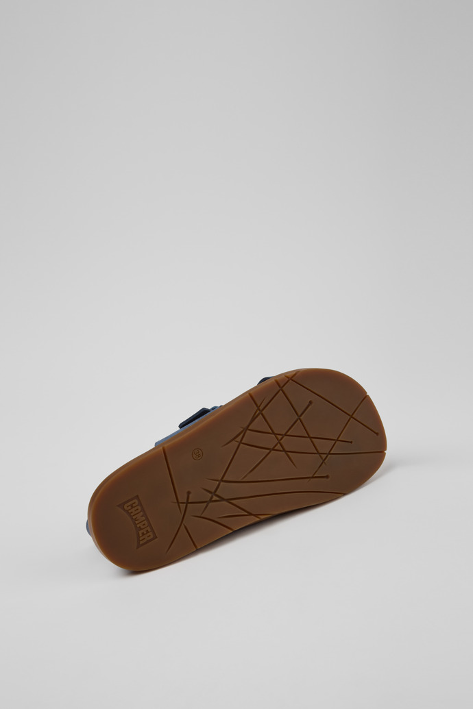 The soles of Lluc Sandal Blue Suede Sandals for Women.