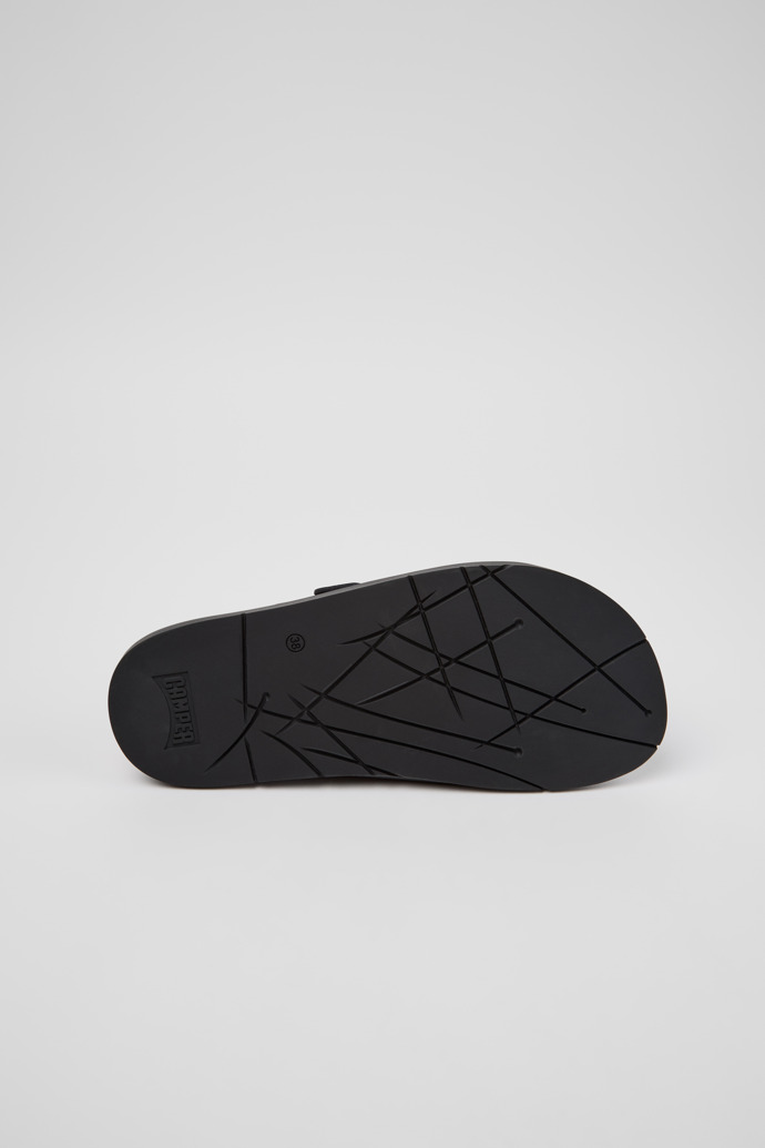 The soles of Lluc Sandal Black Leather Sandals for Women.