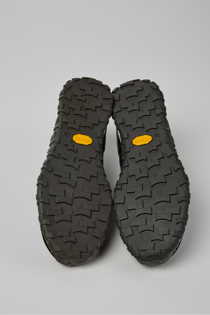 The soles of Drift Walk Black Leather and Nubuck Sneakers for Women.