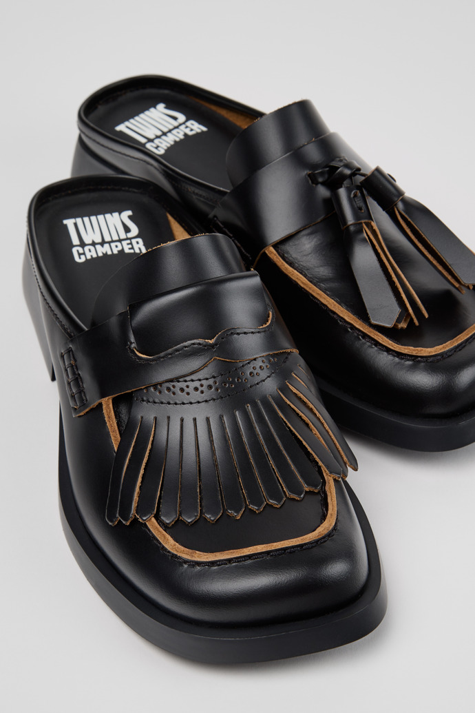 Close-up view of Twins Black Leather Moccasins for Women.